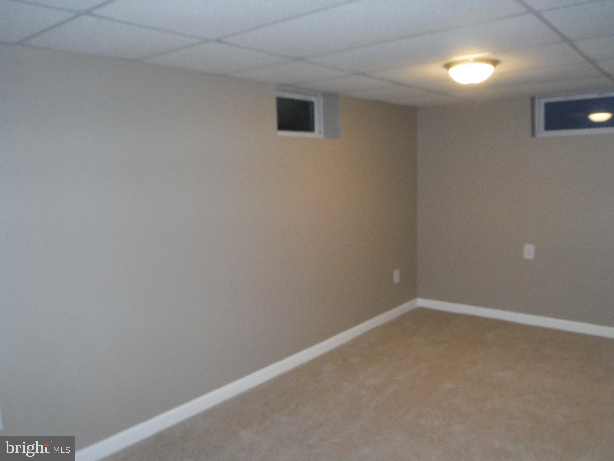 219 Arundel Road Pasadena, MD 21122 - Photo 16 of 26 seperate room in basement for office or exercise