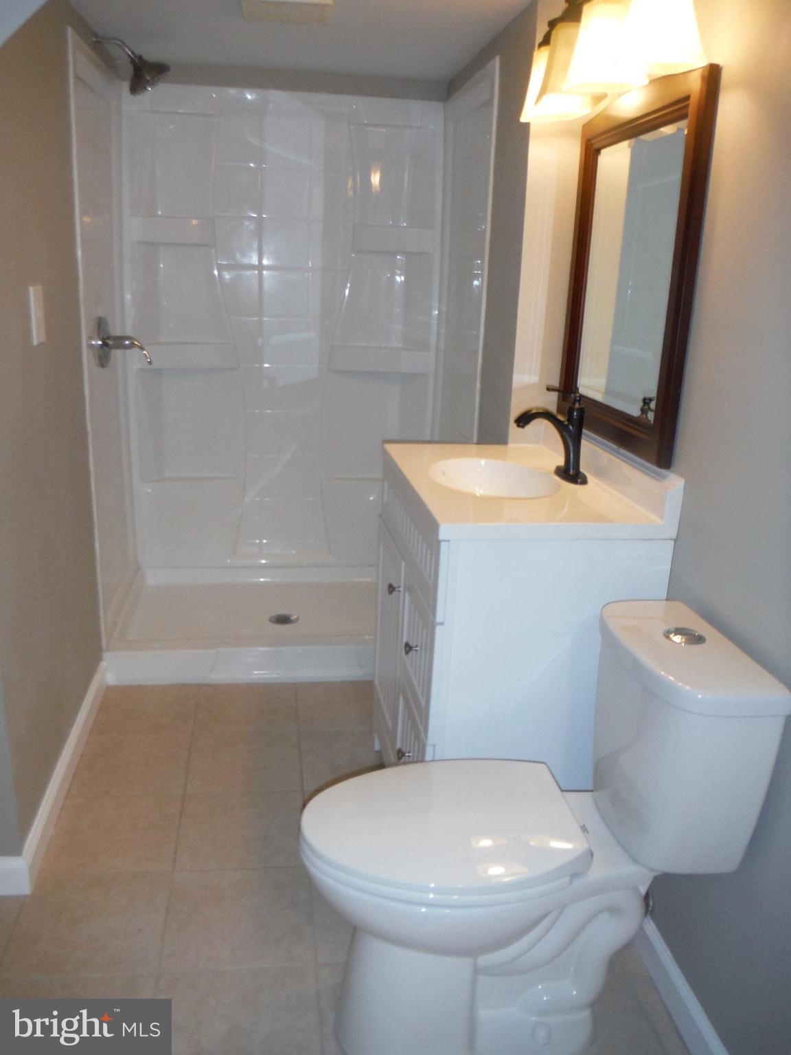 219 Arundel Road Pasadena, MD 21122 - Photo 18 of 26 lower level Bath