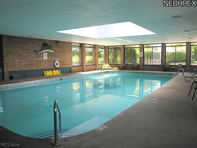 2375 Covington Road, Unit 411 Akron, OH 44313 - Photo 7 of 9 Indoor pool conveniently located off the elevator in the same building as unit #411- the center building of the three building complex