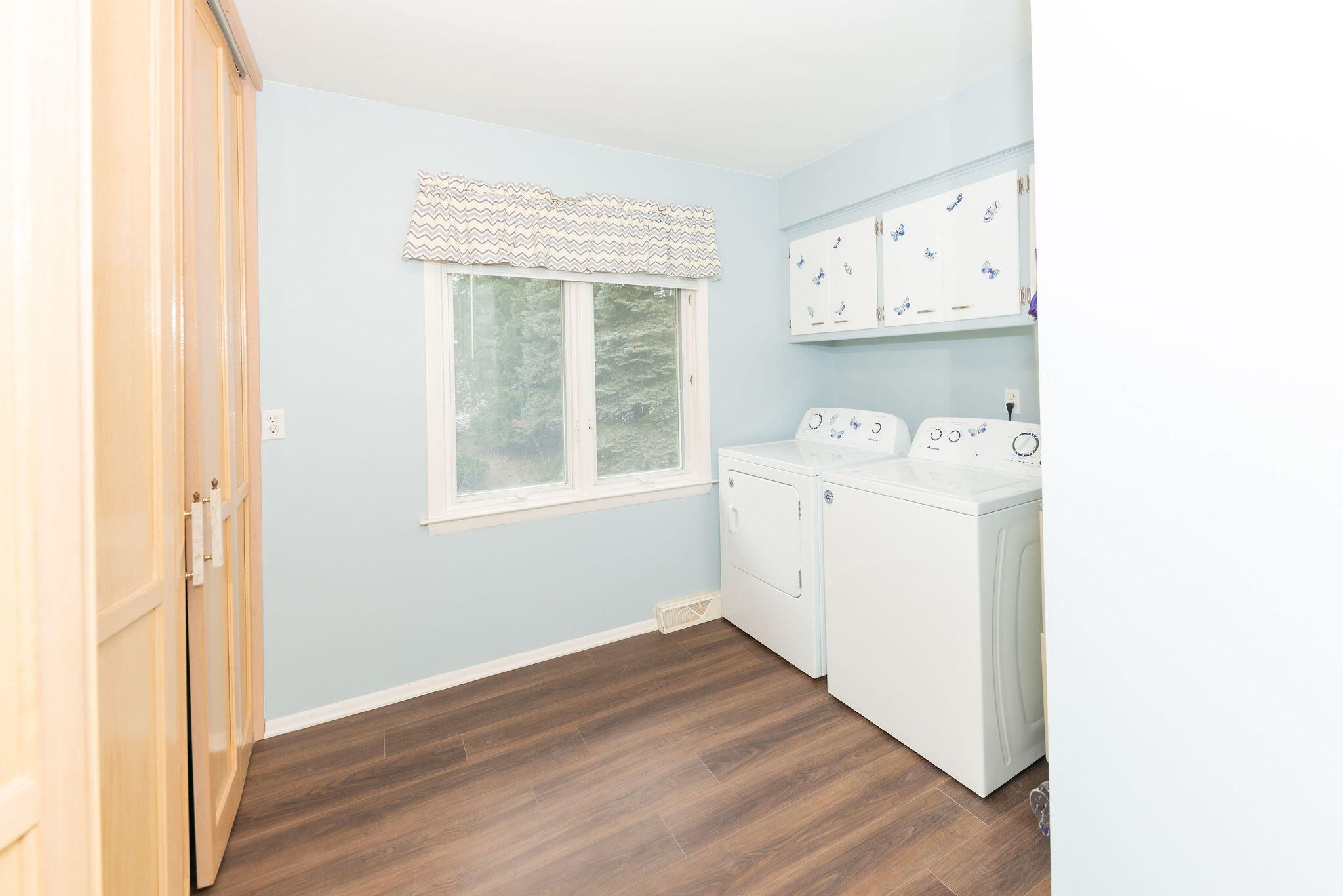 N11W31386 Fairfield Way Delafield, WI 53018 - Photo 20 of 71 Easy access laundry room with storage and a mop sink.