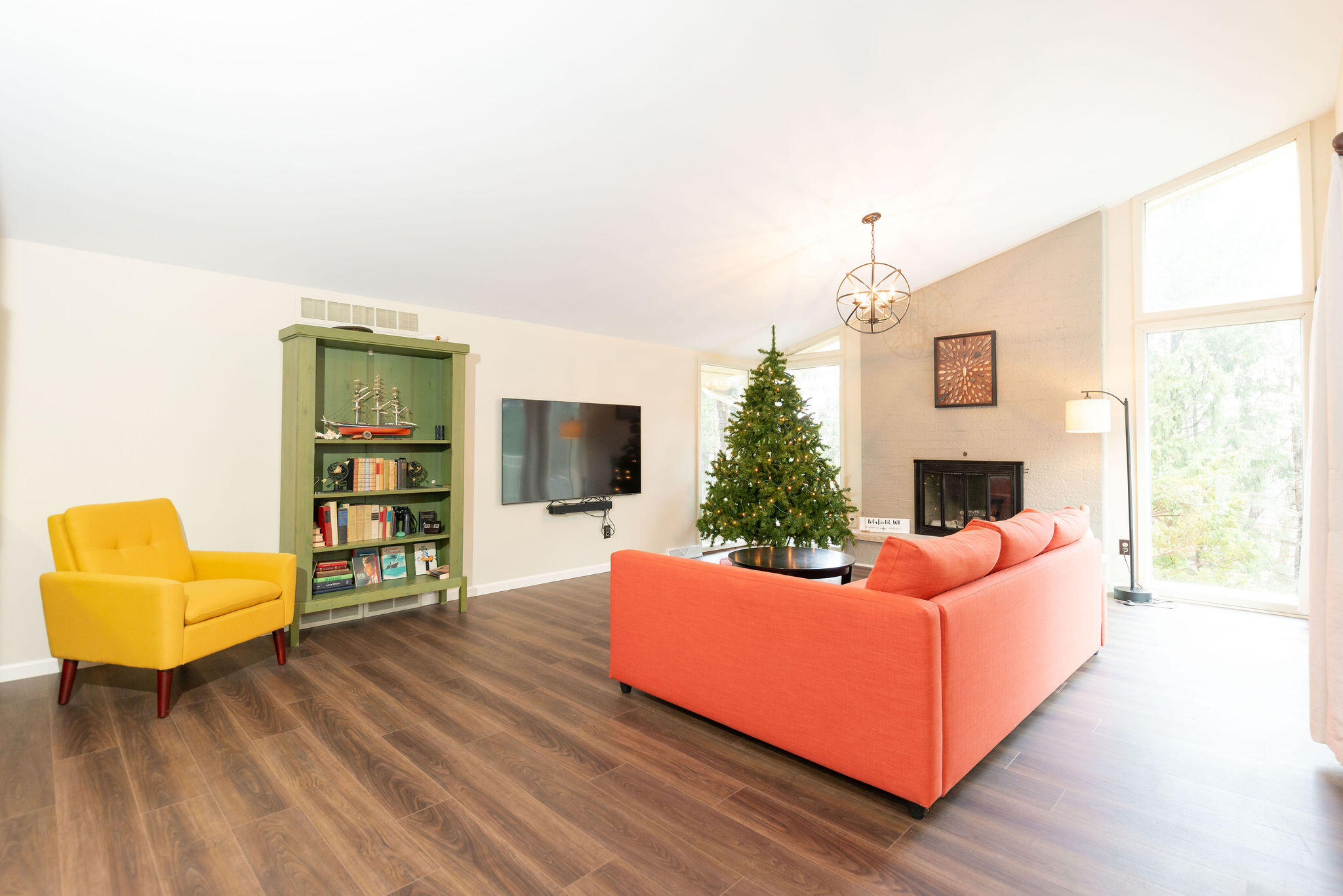 N11W31386 Fairfield Way Delafield, WI 53018 - Photo 2 of 71 Large living room with fireplace and lots of light.