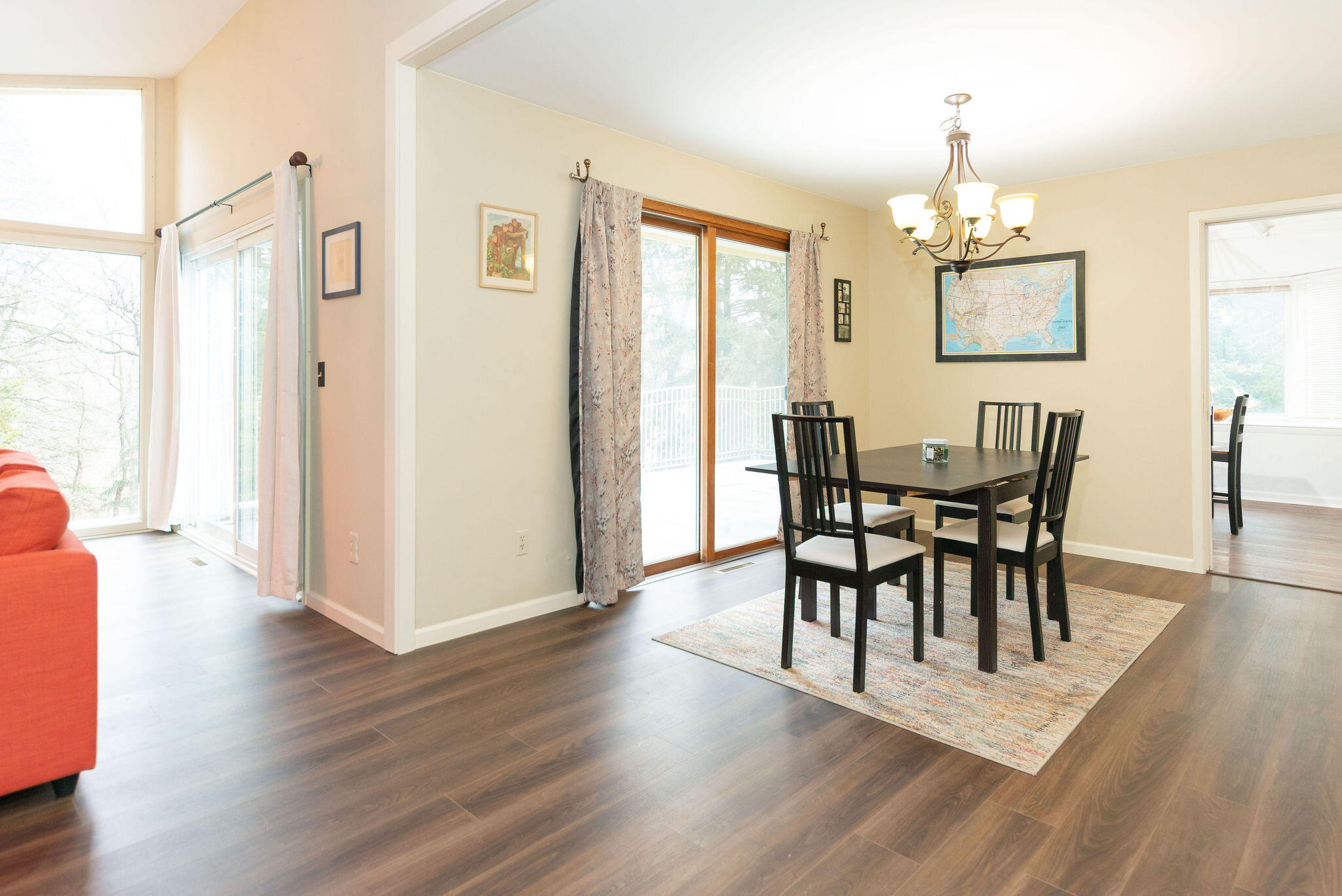 N11W31386 Fairfield Way Delafield, WI 53018 - Photo 8 of 71 Dining room off living room with access to the large deck overlooking the magnificent back yard