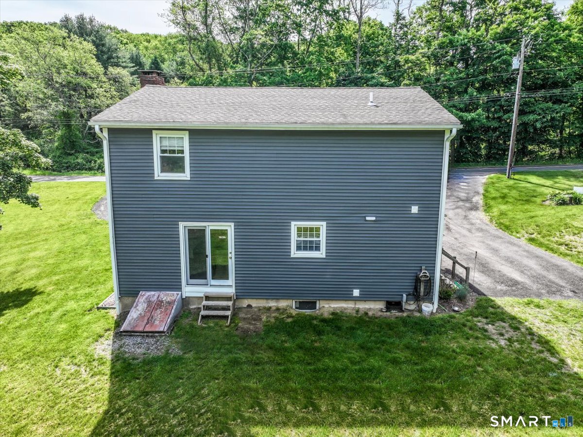 19 Botsford Hill Road Newtown, CT 06470 - Photo 35 of 40 a aerial view of a house with a yard
