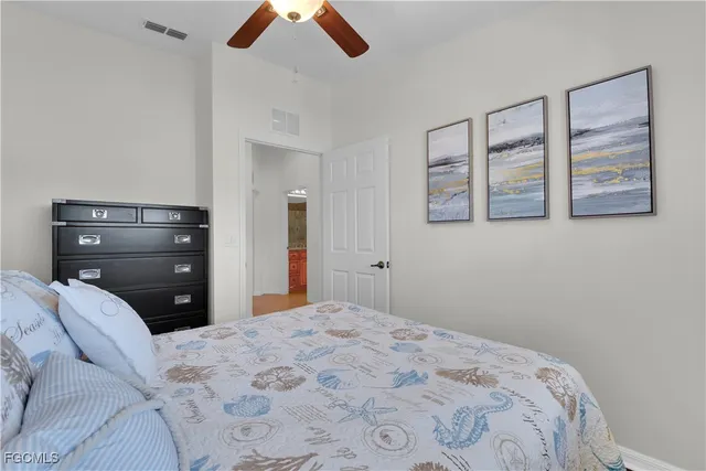 a bedroom with a bed and a closet