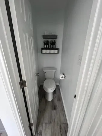 a bathroom with a toilet and a sink