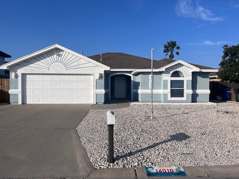 14010 Hawksnest Bay Drive Corpus Christi, TX 78418 - Photo 2 of 22 a front view of a house with a yard