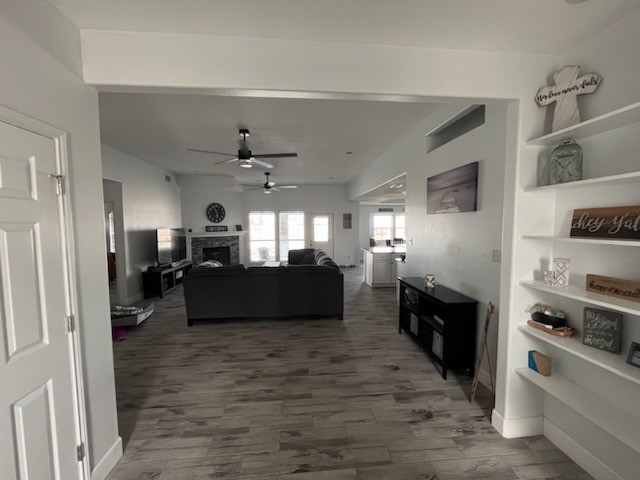 14010 Hawksnest Bay Drive Corpus Christi, TX 78418 - Photo 3 of 22 a living room with furniture and a fireplace
