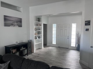 14010 Hawksnest Bay Drive Corpus Christi, TX 78418 - Photo 4 of 22 a view of a bedroom with wooden floor and closet