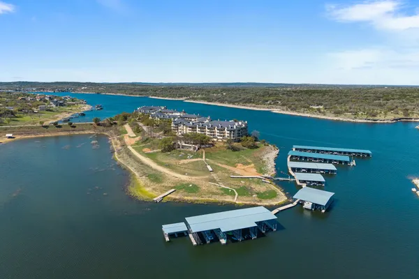 an aerial view of a house with a ocean view
