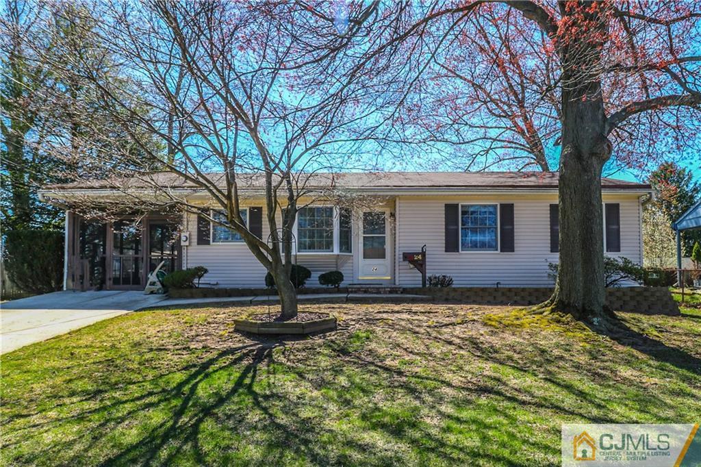 24 Purdue Road Old Bridge, NJ 08859 - Photo 1 of 25 a view of a house with backyard and tree