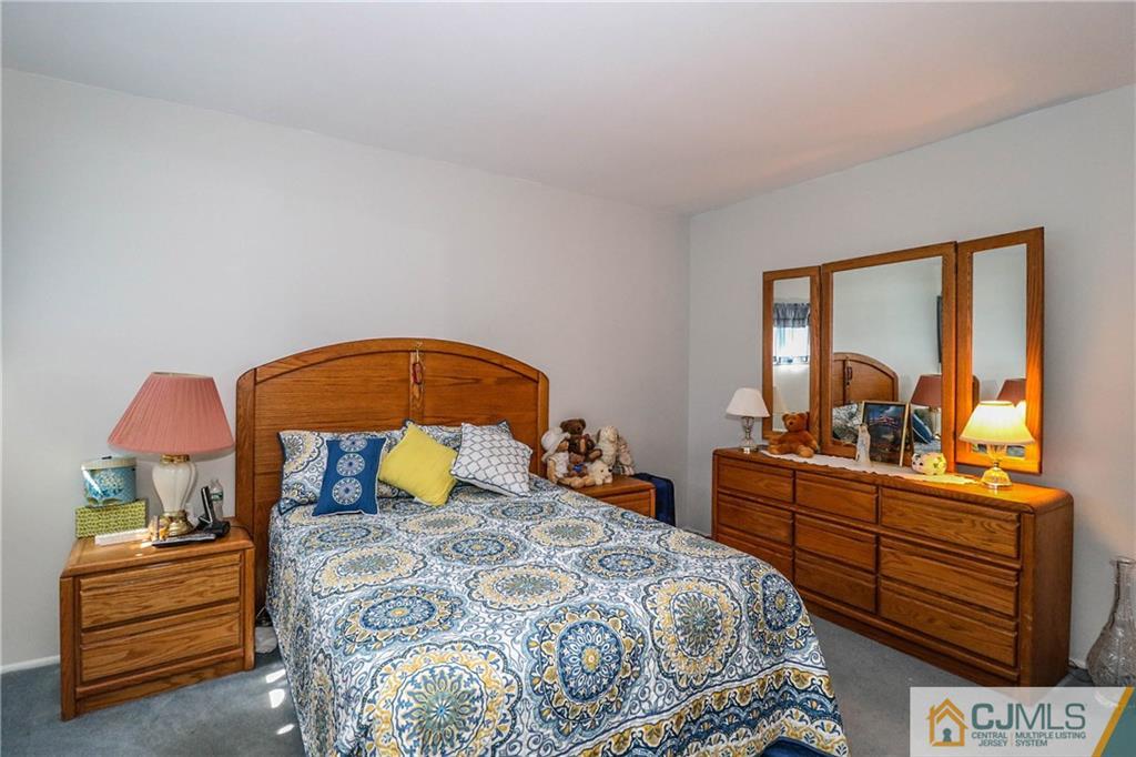 24 Purdue Road Old Bridge, NJ 08859 - Photo 16 of 25 a bedroom with a bed and window