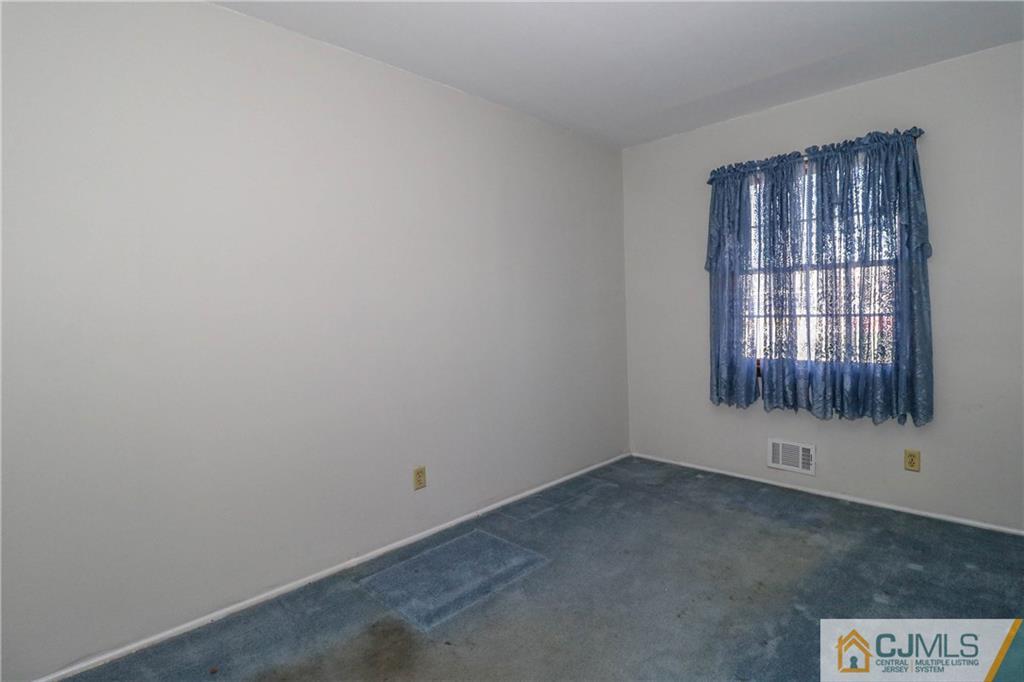 24 Purdue Road Old Bridge, NJ 08859 - Photo 18 of 25 an empty room with a window