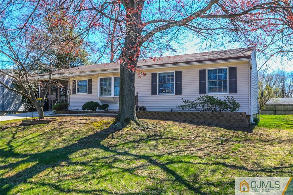 24 Purdue Road Old Bridge, NJ 08859 - Photo 3 of 25 a front view of house with yard and green space