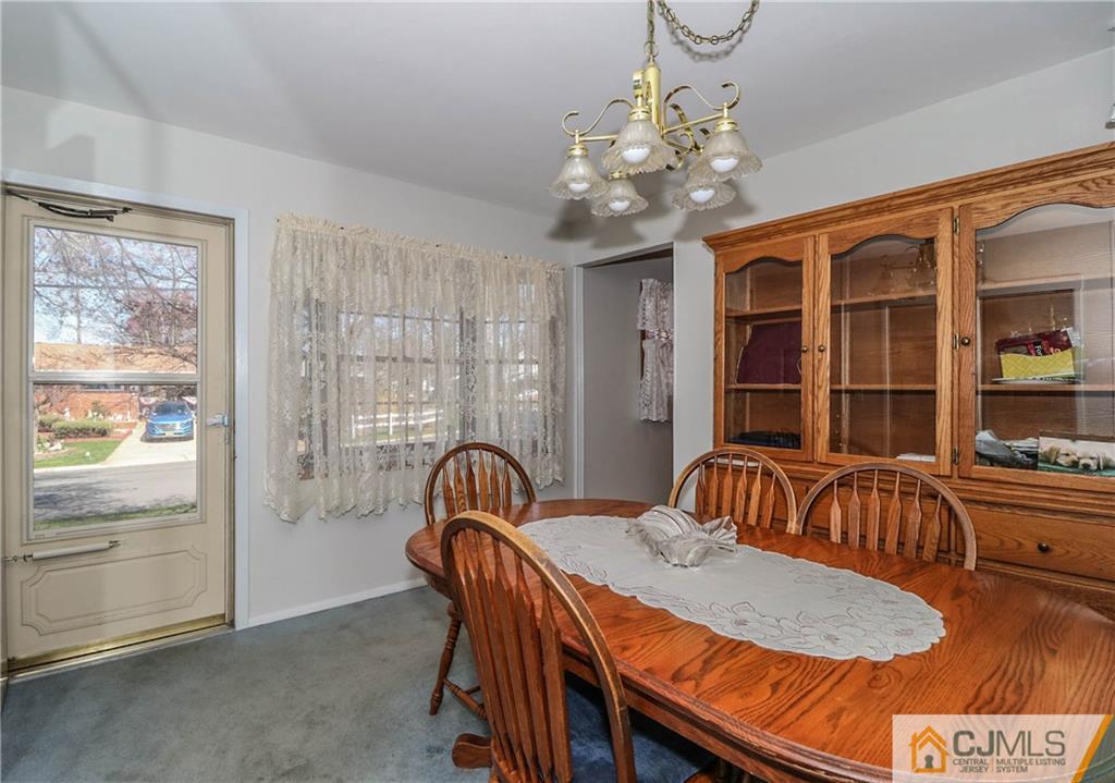 24 Purdue Road Old Bridge, NJ 08859 - Photo 10 of 25 a view of a dining room with furniture window and outside view