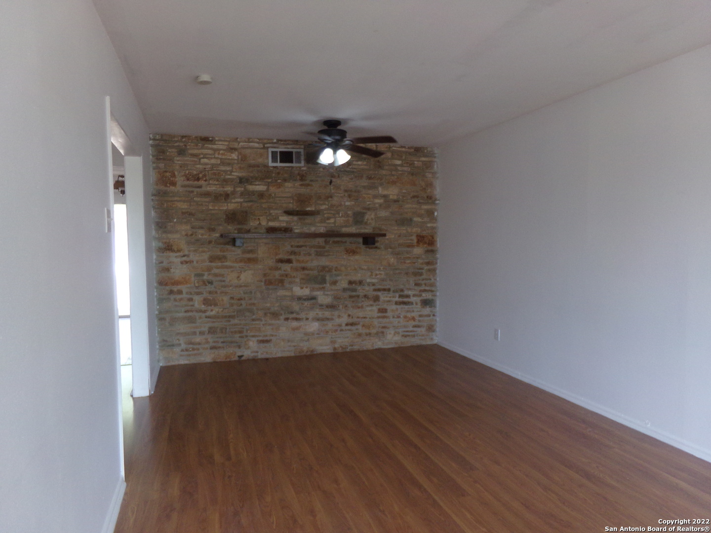 5975 Babcock Road San Antonio, TX 78240 - Photo 12 of 29 a view of empty room with wooden floor