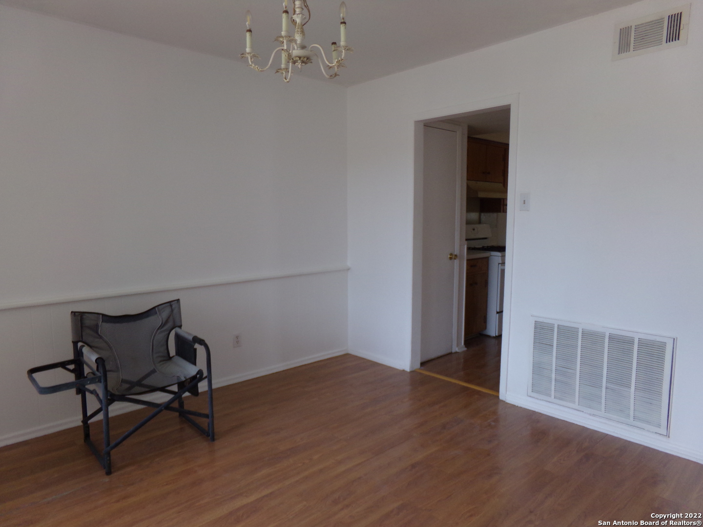 5975 Babcock Road San Antonio, TX 78240 - Photo 13 of 29 a view of a room with wooden floor and windows