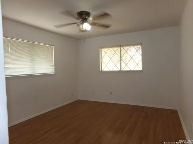 a view of a bathroom from a hallway