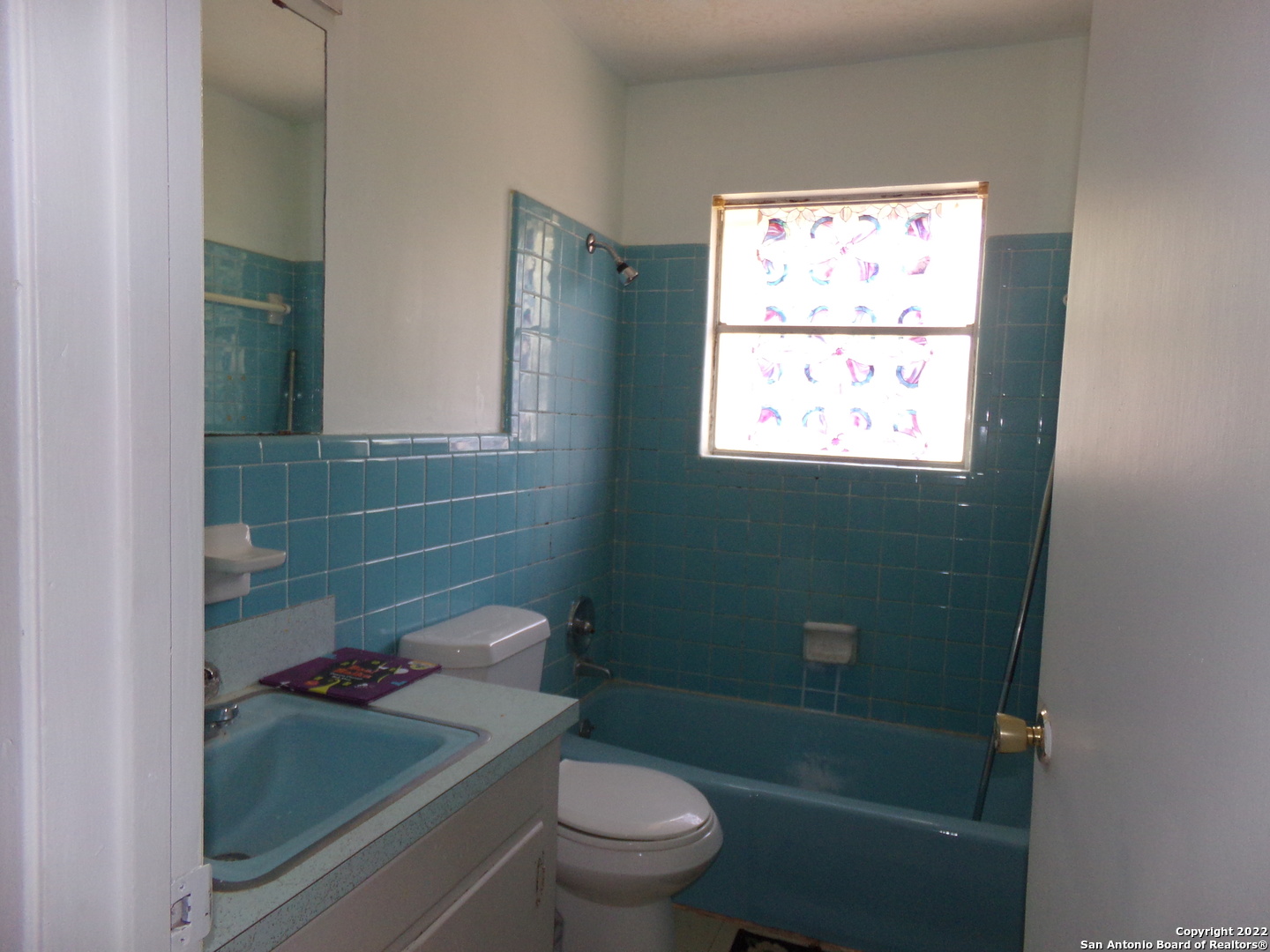 5975 Babcock Road San Antonio, TX 78240 - Photo 29 of 29 a bathroom with a toilet a sink and a shower