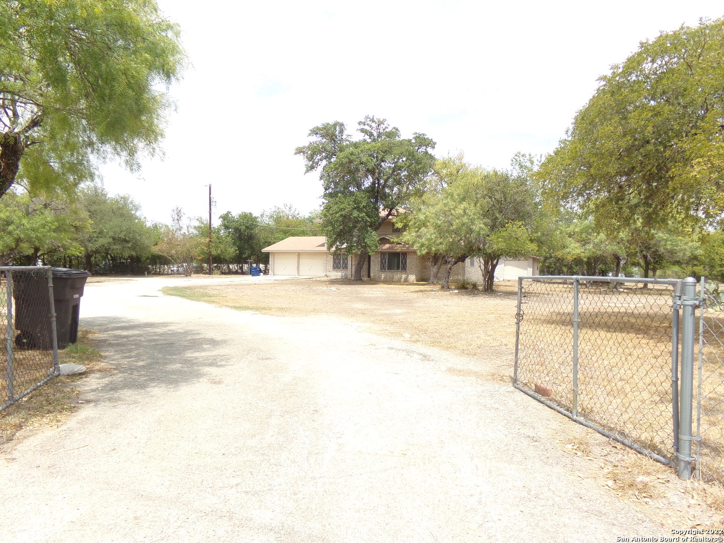 5975 Babcock Road San Antonio, TX 78240 - Photo 4 of 29 a view of yard and swimming pool