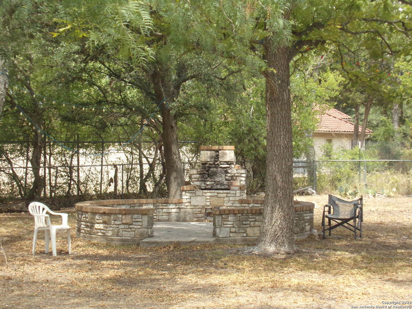5975 Babcock Road San Antonio, TX 78240 - Photo 5 of 29 a view of a chairs and table in patio