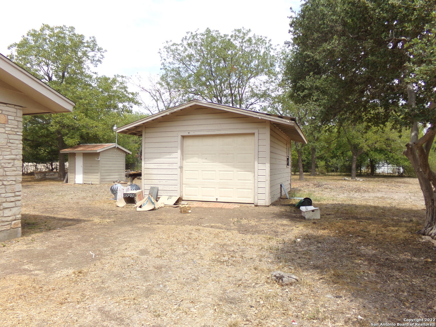 5975 Babcock Road San Antonio, TX 78240 - Photo 9 of 29 a view of a house with a yard covered in snow