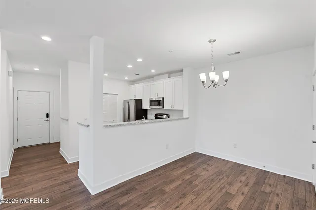 a view of a house with wooden floor