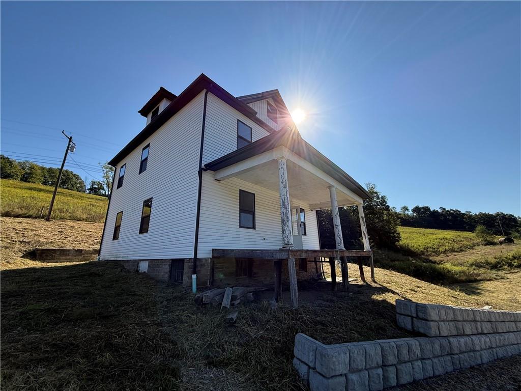 a house view with a backyard space