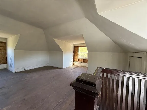 a view of an empty room and window