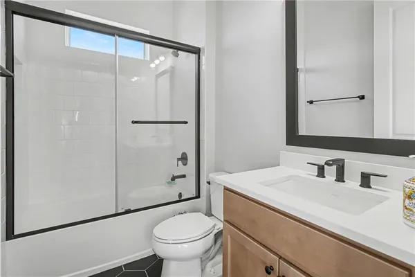 a view of a big room with table and chairs