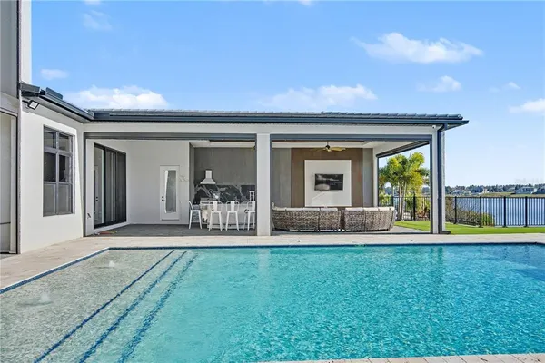 a view of outdoor space with swimming pool