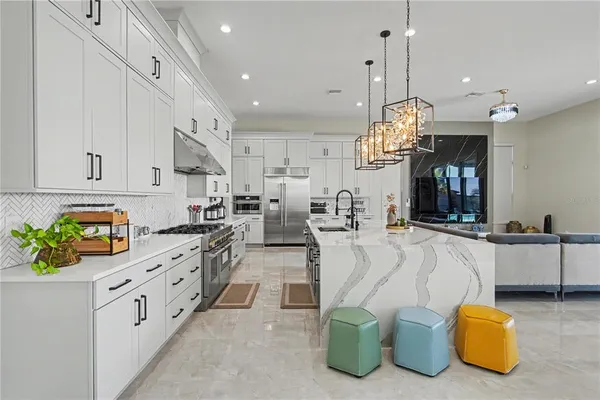 a kitchen with counter top space cabinets and outdoor space