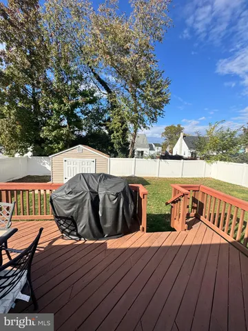 a view of sitting area on roof with furniture