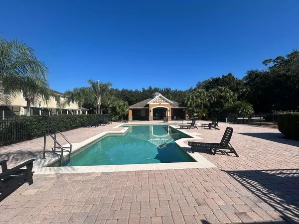 a view of a terrace with sitting area