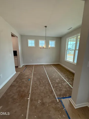 a view of a hallway with a couch