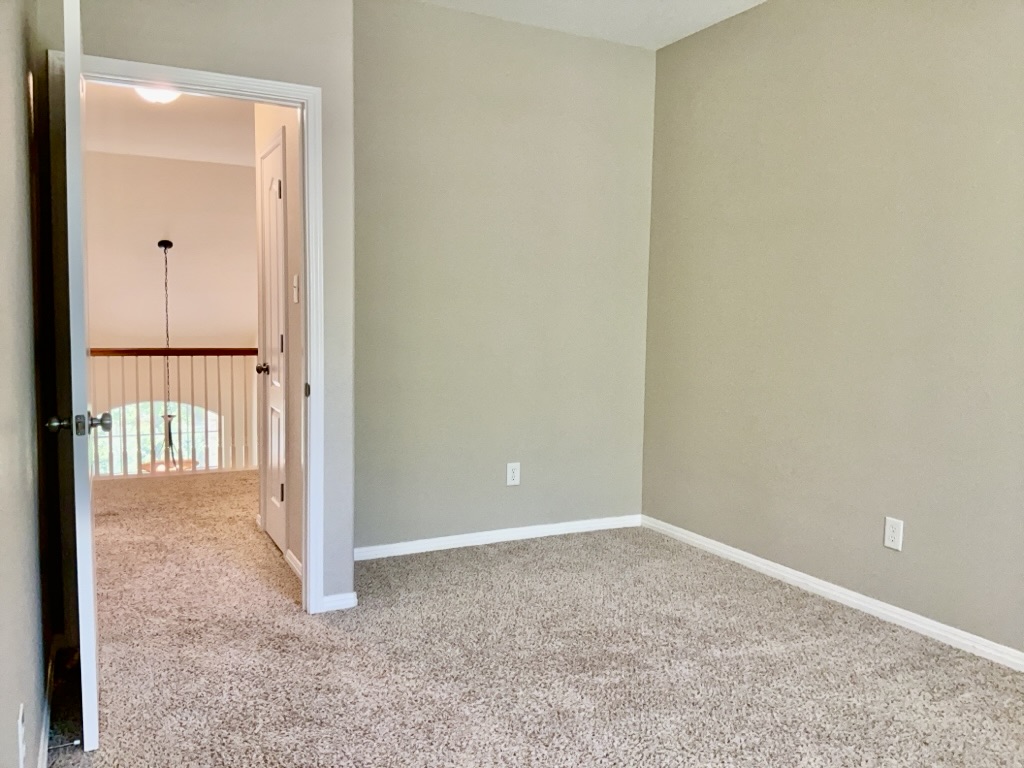 2518 Vestavia Ridge Lane Cedar Park, TX 78613 - Photo 16 of 23 Bedroom featuring light colored carpet and baseboards