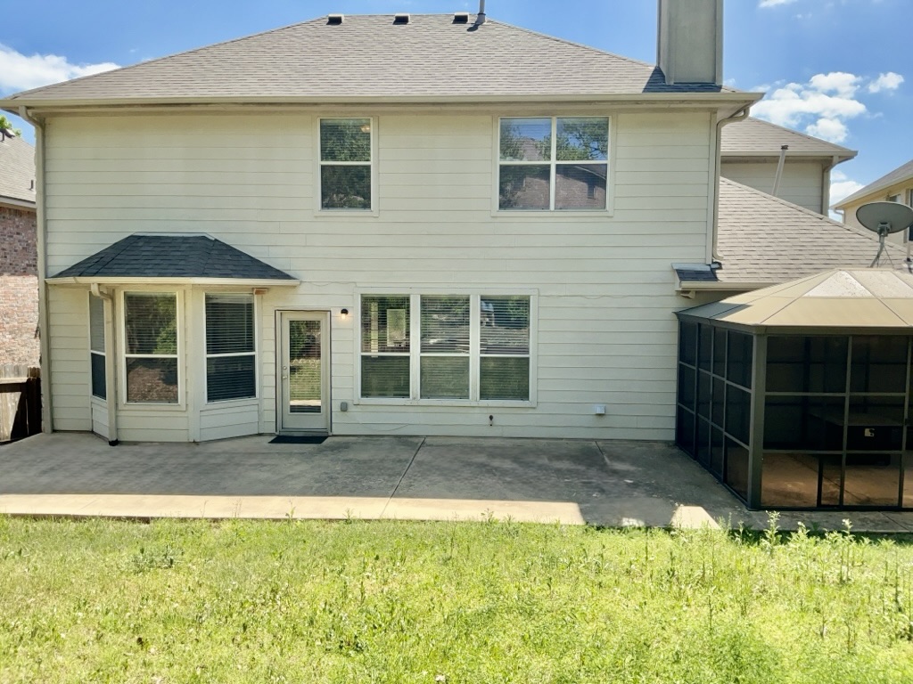 2518 Vestavia Ridge Lane Cedar Park, TX 78613 - Photo 22 of 23 Rear view of property with a patio area, a shingled roof, a yard, and a chimney