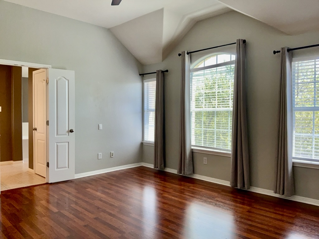 2518 Vestavia Ridge Lane Cedar Park, TX 78613 - Photo 8 of 23 Formal Dining Room with dark wood-style floors, lofted ceiling, and ceiling fan