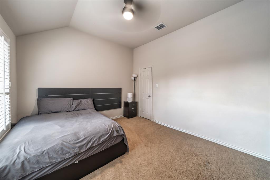 720 Nighthawk Drive Murphy, TX 75094 - Photo 32 of 40 a bedroom with a bed and a window
