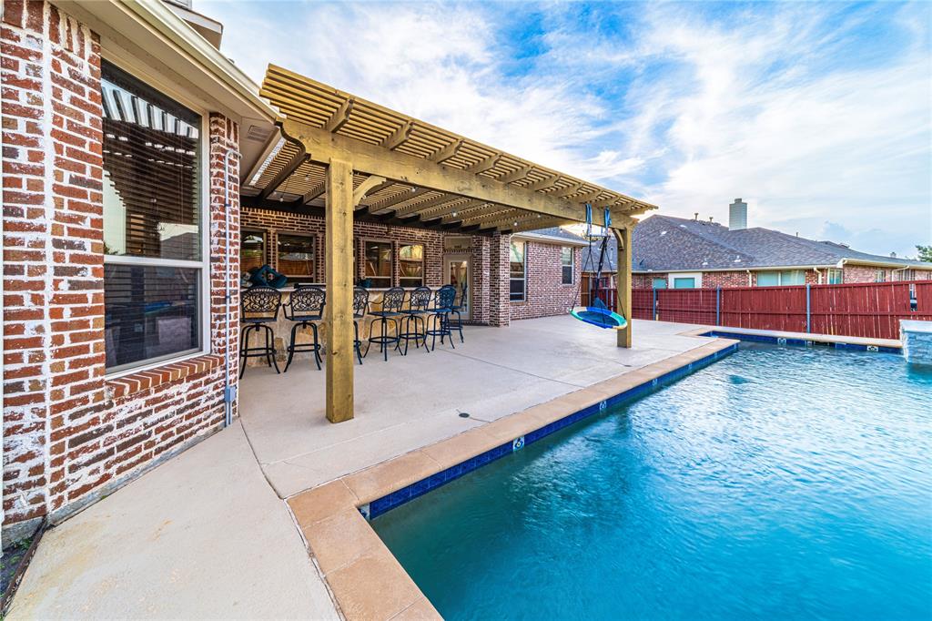 720 Nighthawk Drive Murphy, TX 75094 - Photo 40 of 40 swimming pool view with a outdoor seating