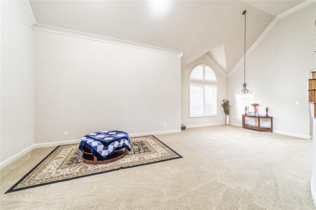 720 Nighthawk Drive Murphy, TX 75094 - Photo 5 of 40 a view of a big room with closet and windows