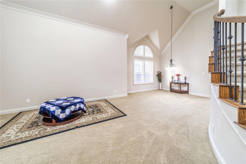 720 Nighthawk Drive Murphy, TX 75094 - Photo 8 of 40 a living room with furniture and a window