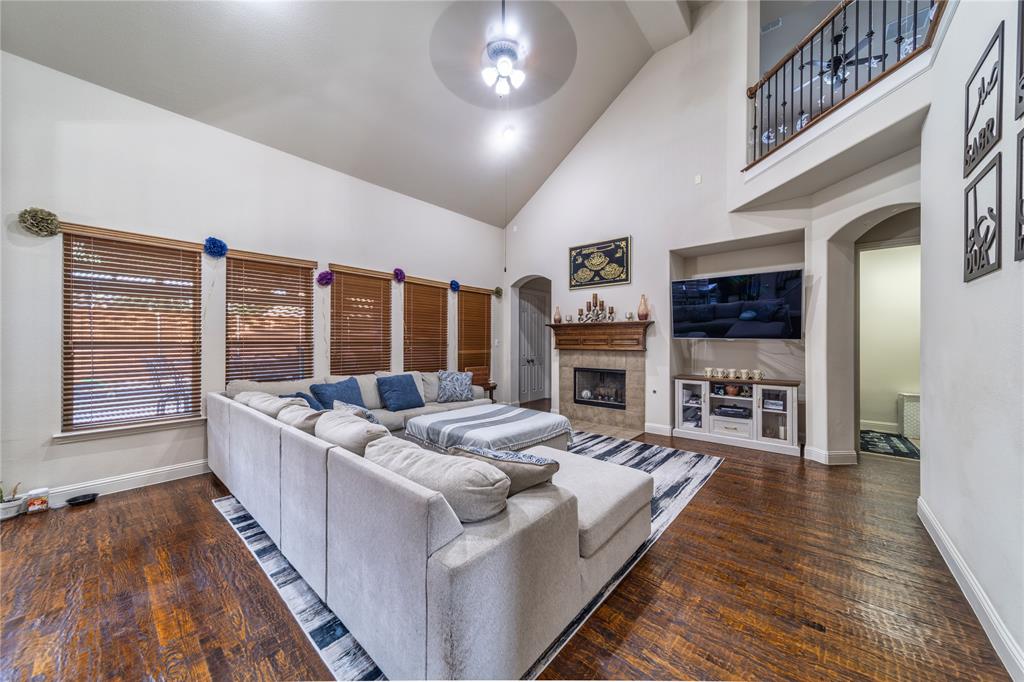 720 Nighthawk Drive Murphy, TX 75094 - Photo 9 of 40 a living room with furniture fireplace and flat screen tv