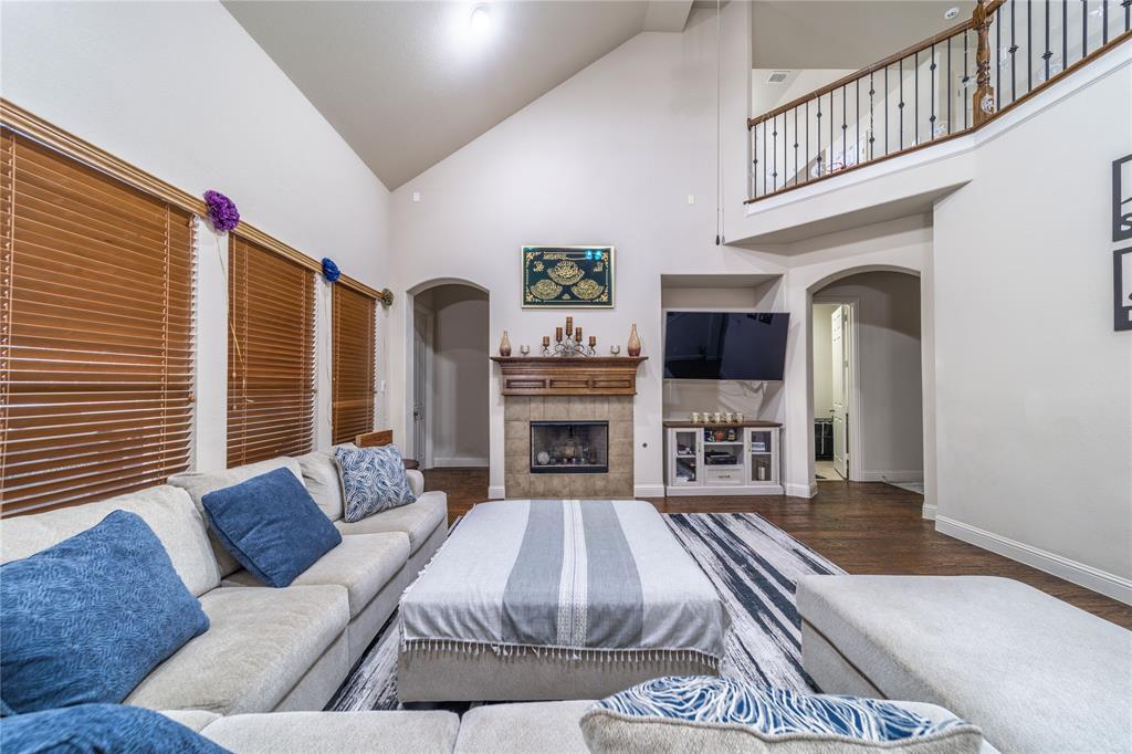 720 Nighthawk Drive Murphy, TX 75094 - Photo 10 of 40 a living room with furniture fireplace and flat screen tv