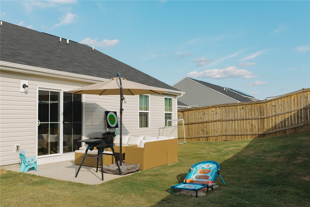 314 Callie Way Easley, SC 29642 - Photo 25 of 27 This spacious yard offers a perfect blend of outdoor relaxation and privacy.