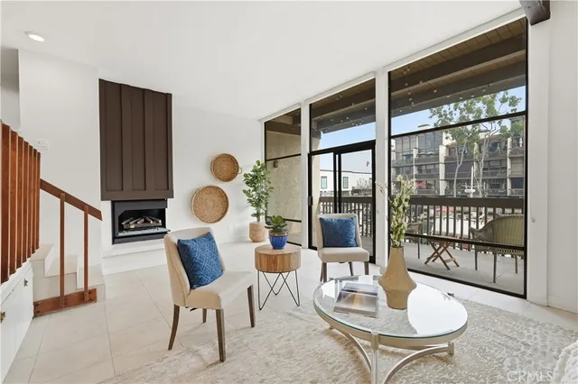 a living room with furniture and a table