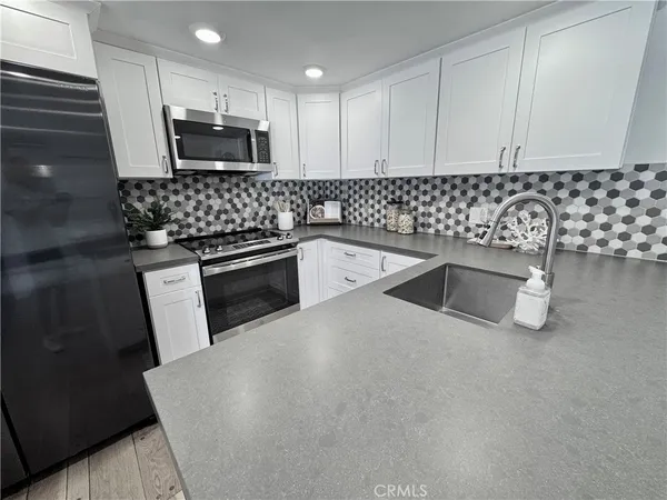 $699,000 | 6126 Marina Pacifica Drive, Long Beach, CA 90803