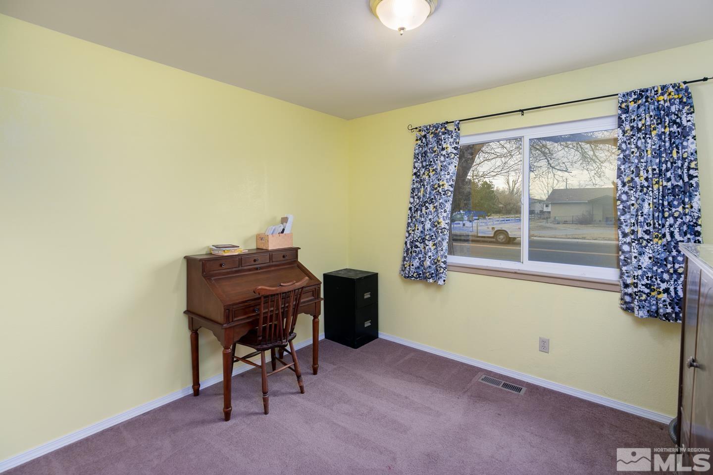 1080 Lee Fallon, NV 89406 - Photo 11 of 23 a room with a desk and chair