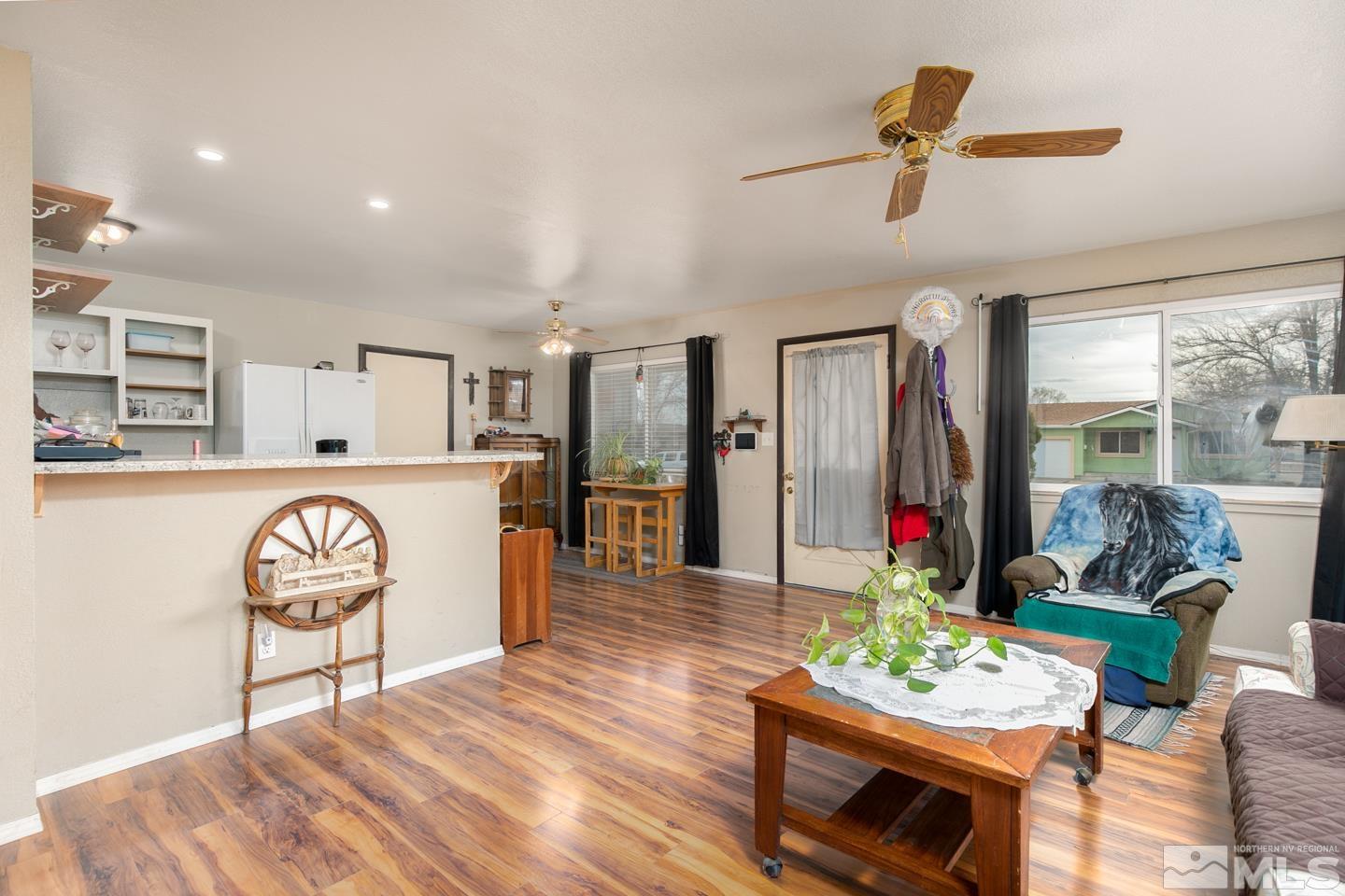 1080 Lee Fallon, NV 89406 - Photo 5 of 23 a living room with furniture and a wooden floor