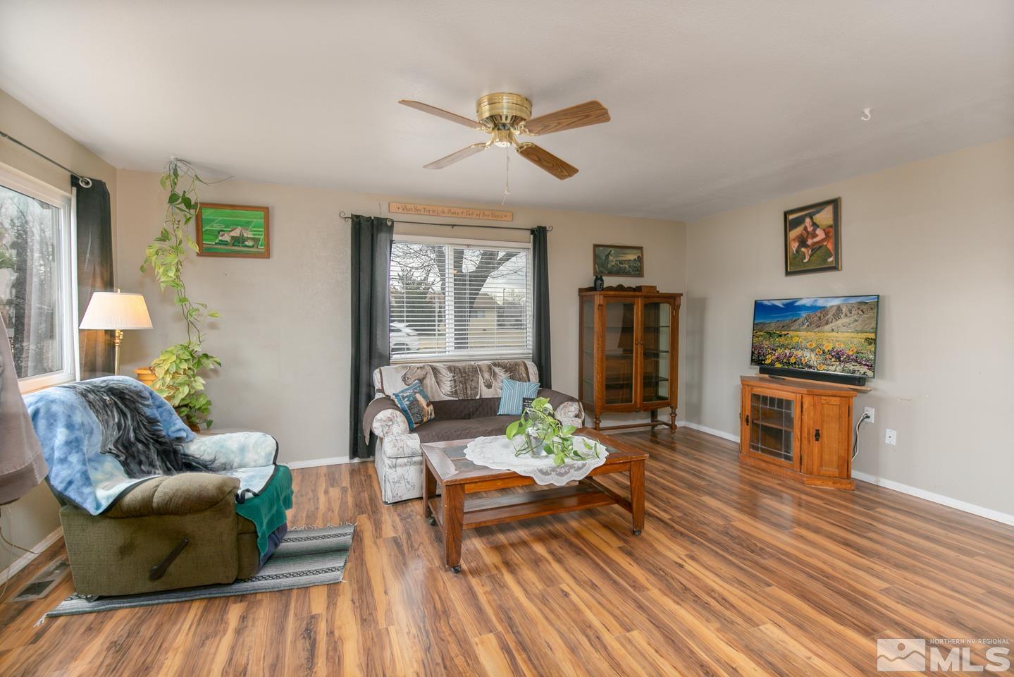 1080 Lee Fallon, NV 89406 - Photo 6 of 23 a living room with furniture a flat screen tv and a table