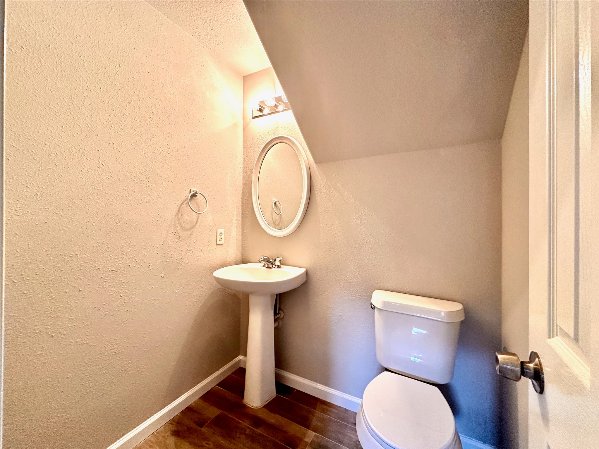 3042 Trinity Pass Court Spring, TX 77373 - Photo 18 of 34 a bathroom with a toilet and a sink